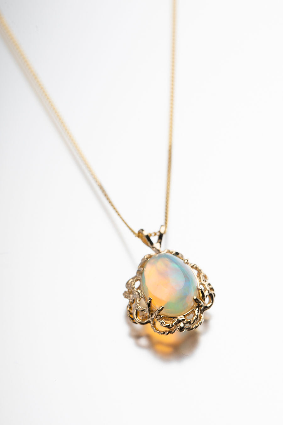 Gold Pendant with Opal