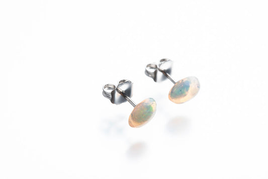 14k white gold earrings with genuine opals